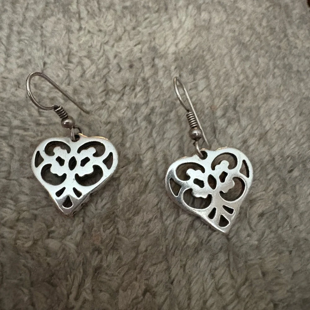 Silver tone heart filagree earrings
